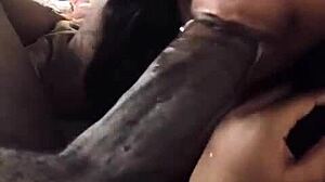 Amateur black girl gives a deepthroat blowjob to big black cock