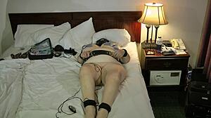 Amateur grandmother's electro BDSM play with bondage and boobs